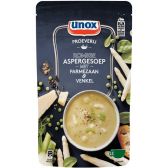 Unox Tasting asparagus soup